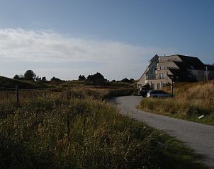 Omgeving van Duinrust vakantieappartement in Nes Ameland met duinen.