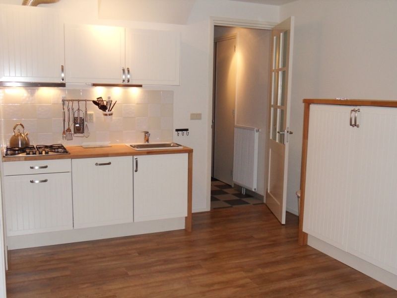 Volledig uitgeruste keuken in vakantiehuis Type 8 - 2108, De Cocksdorp, Texel, met moderne faciliteiten.