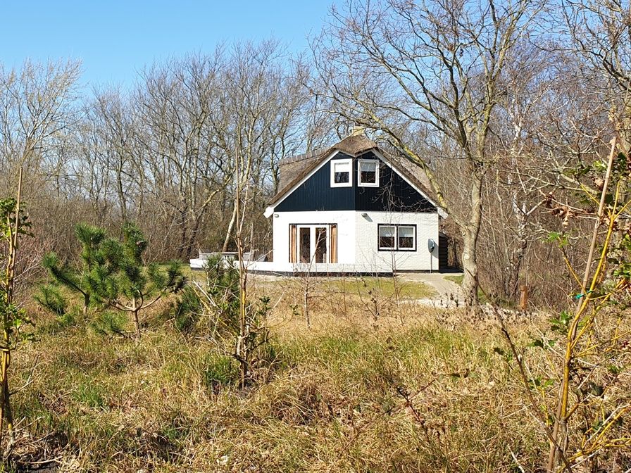 De Velduil vakantiehuis in De Cocksdorp, Texel omringd door natuur.