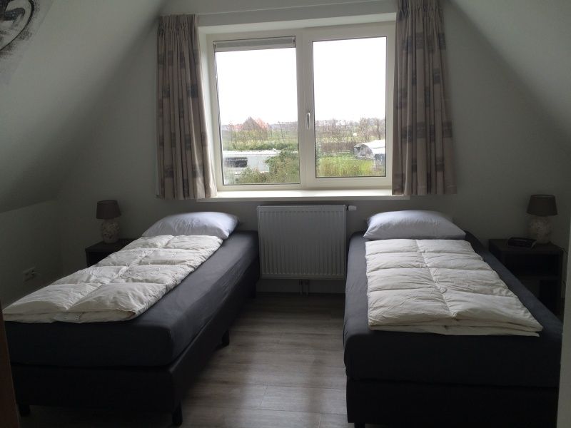 Tweede slaapkamer in Zevenbergen Texel - Bungalow Zevenbergen met serene omgeving.