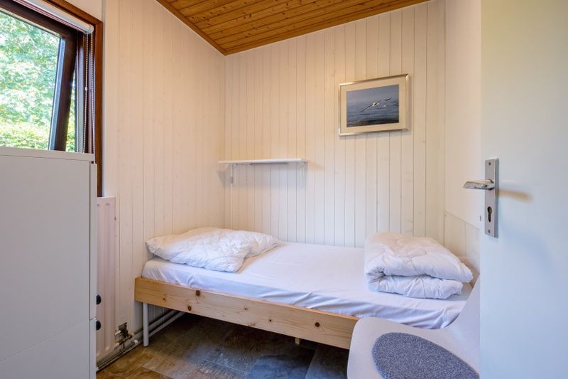 Gemuetliches Einzelzimmer im Ferienhaus Slufterduin 092, De Cocksdorp, Texel, ideal fuer eine ruhige Nachtruhe auf den Watteninseln.