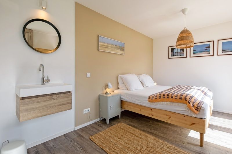 Comfortabele slaapkamer in Vakantiehuis Slufteroord 292, Bungalowpark Slufteroord, De Cocksdorp, Texel, met moderne inrichting.