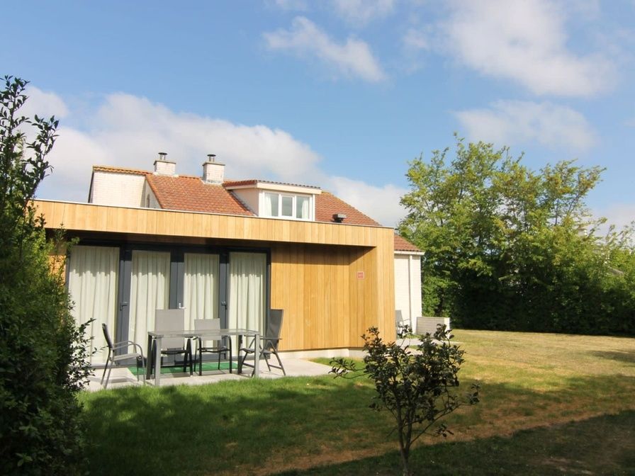 Vacation home D 449 in De Cocksdorp, Texel with sunny terrace and green garden, ideal for relaxation on the Wadden Islands.