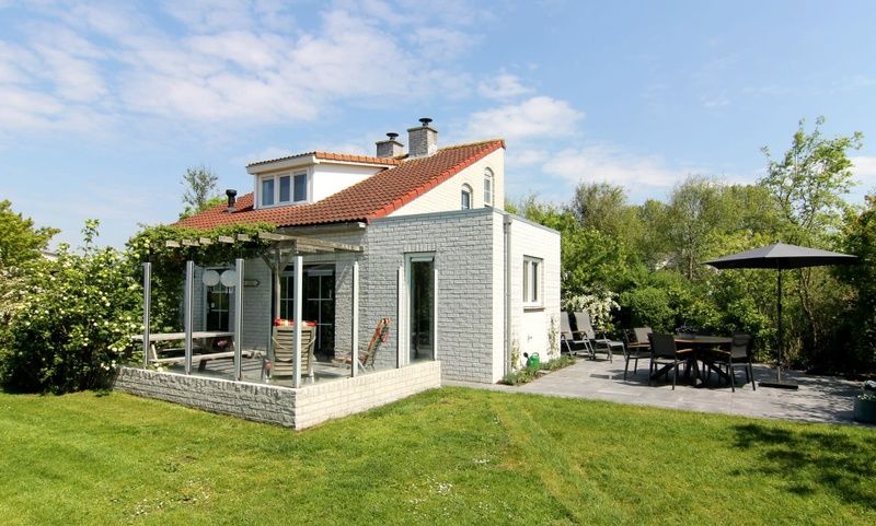 Vakantiehuis D 685 in De Cocksdorp, Texel biedt een charmant verblijf met zonnig terras en groene omgeving op de Waddeneilanden.