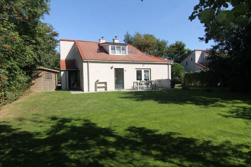 Vakantiehuis D 603 in De Cocksdorp, Texel, met ruime tuin en terras, ideaal voor een ontspannen verblijf op de Waddeneilanden.