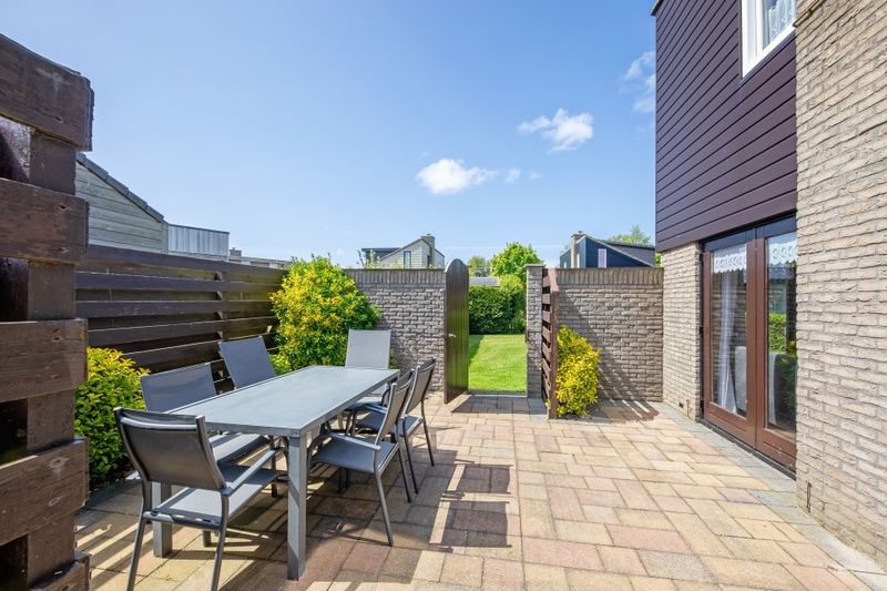 Enjoy the sunny patio of Holiday home A 309 in De Cocksdorp, Texel. Ideal for relaxation on the Wadden Islands.