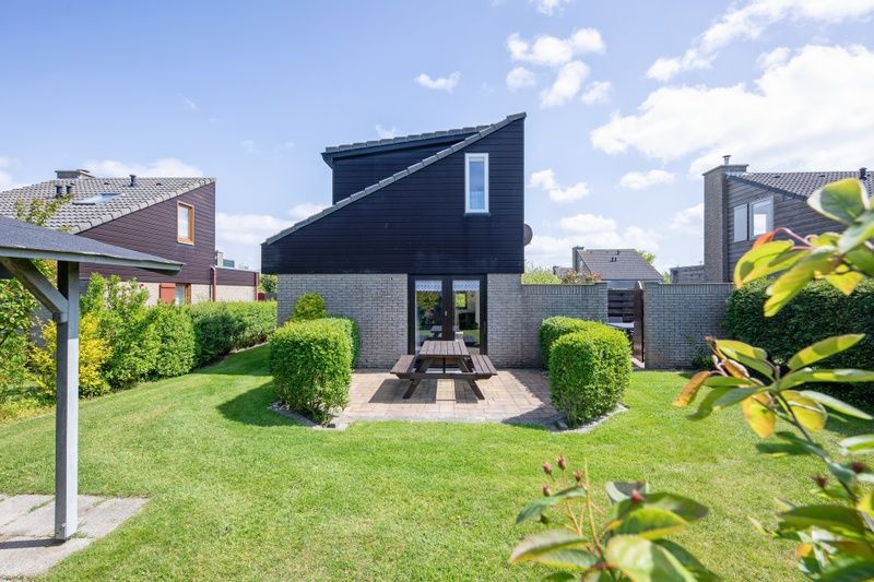 Vacation home A 309 in De Cocksdorp, Texel with spacious garden and sunny terrace, ideal for relaxation on the Wadden Islands.