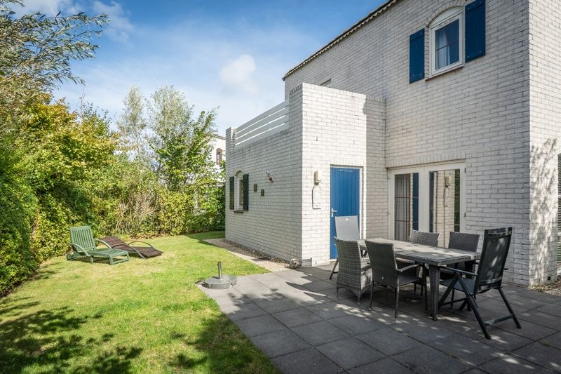 Enjoy the sun on the terrace of Holiday home F 549 in De Cocksdorp, Texel. Relax in the garden of this charming Wadden Island vacation home.