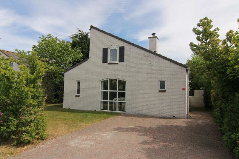 Vakantiehuis E 417 in De Cocksdorp, Texel, Waddeneilanden, biedt een charmant verblijf met ruime tuin en rustieke uitstraling.