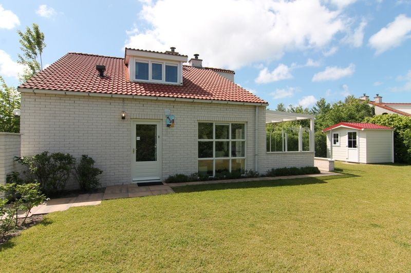 Vakantiehuis D 415 in De Cocksdorp, Texel biedt een charmant verblijf met een zonnig terras en groene tuin op de Waddeneilanden.
