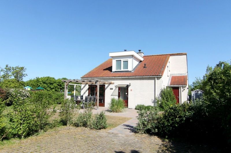 Ferienhaus D 401 in De Cocksdorp, Texel mit Sonnenterrasse inmitten der Natur auf den Watteninseln.