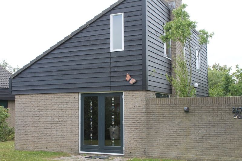 Vakantiehuis A 267 in De Cocksdorp, Texel, biedt een moderne uitstraling met natuurlijke omgeving op de Waddeneilanden.