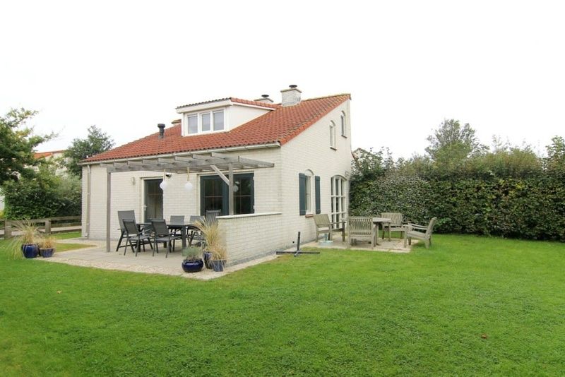 Vakantiehuis D 533 in De Cocksdorp op Texel, een charmant vakantiehuis met terras en groene tuin, ideaal voor een ontspannen verblijf op de Waddeneilanden.
