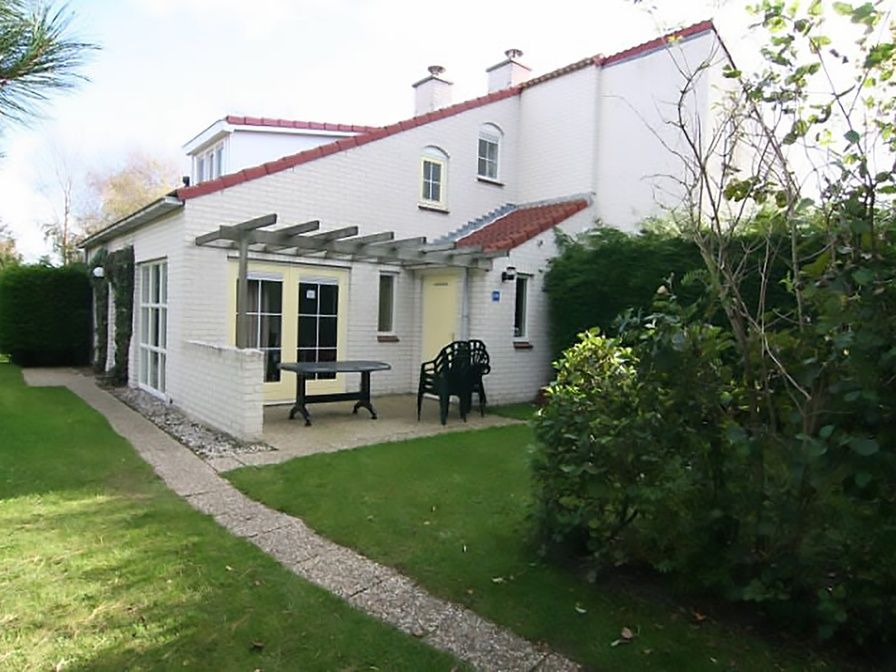 Ferienhaus D 760 in De Cocksdorp, Texel, mit sonniger Terrasse und gruenem Garten, ideal fuer einen entspannten Aufenthalt auf den Watteninseln.