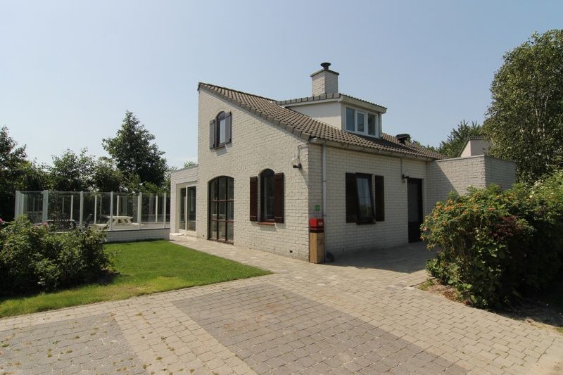 Vakantiehuis G 769 in De Cocksdorp, Texel, met ruime tuin en terras, ideale locatie voor een ontspannen verblijf op de Waddeneilanden.