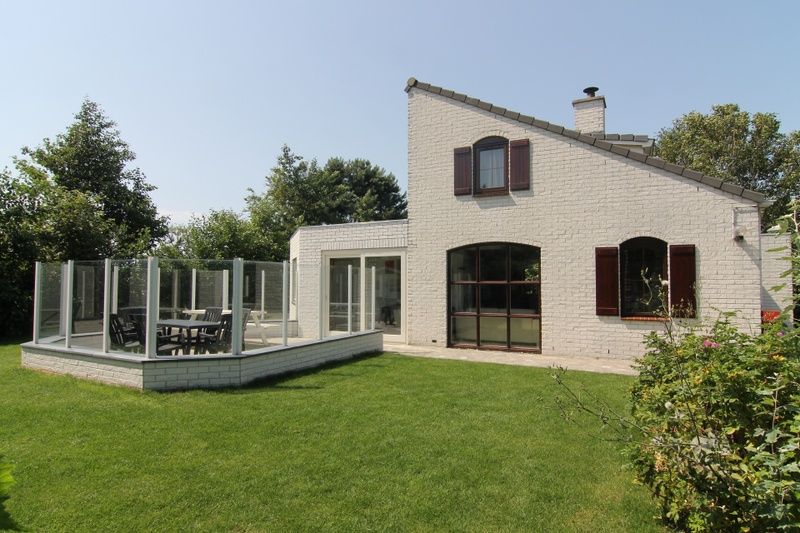 Vakantiehuis G 769 in De Cocksdorp, Texel met zonnig terras en groene tuin, ideaal voor een ontspannen verblijf op de Waddeneilanden.