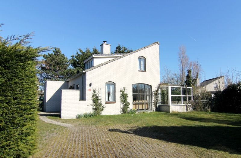 Vakantiehuis F 569 in De Cocksdorp, Texel biedt een charmant verblijf met ruime tuin en zonnige veranda op de Waddeneilanden.