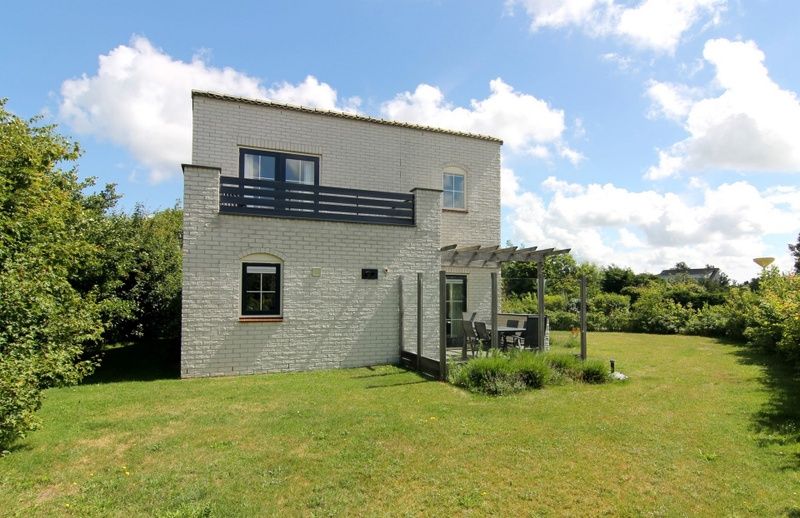 Vakantiehuis F 808 in De Cocksdorp, Texel, met ruime tuin en terras, ideaal voor een ontspannen verblijf op de Waddeneilanden.