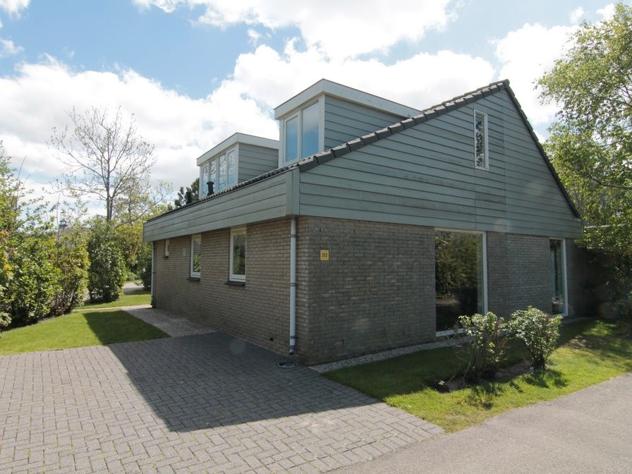 Vakantiehuis G 263 in De Cocksdorp, Texel, biedt een moderne uitstraling met ruime tuin en natuurlijke omgeving op de Waddeneilanden.