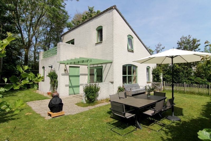 Ferienhaus F 789 in De Cocksdorp, Texel: charmante Unterkunft mit Sonnenterrasse und gruenem Garten, ideal fuer Entspannung auf den Watteninseln.