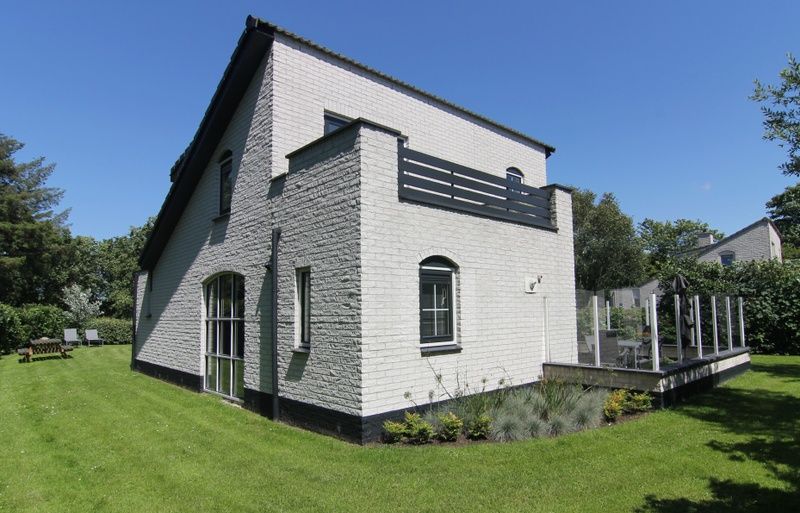 Vacation home F 776 in De Cocksdorp, Texel offers a charming accommodation with a spacious garden and sunny terrace, ideal for a relaxing vacation.