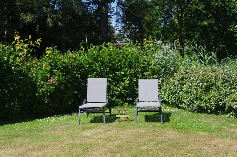 Relax in the garden of Holiday home F 776 in De Cocksdorp, Texel. Enjoy nature on the Wadden Islands.