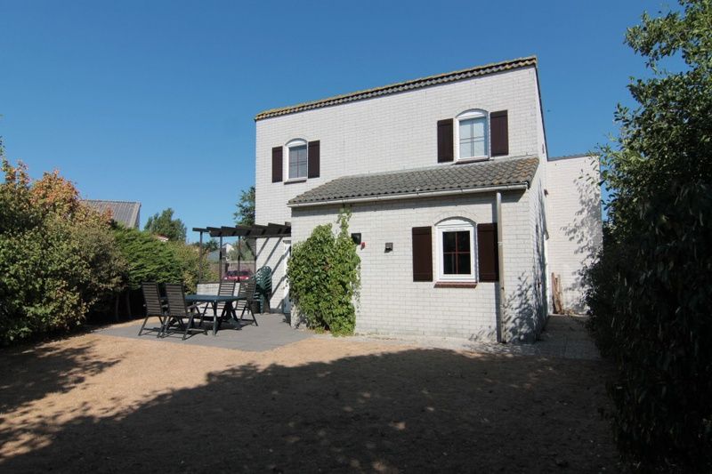 Vakantiehuis E 413 in De Cocksdorp, Texel, met ruime tuin en terras, ideaal voor een ontspannen verblijf op de Waddeneilanden.