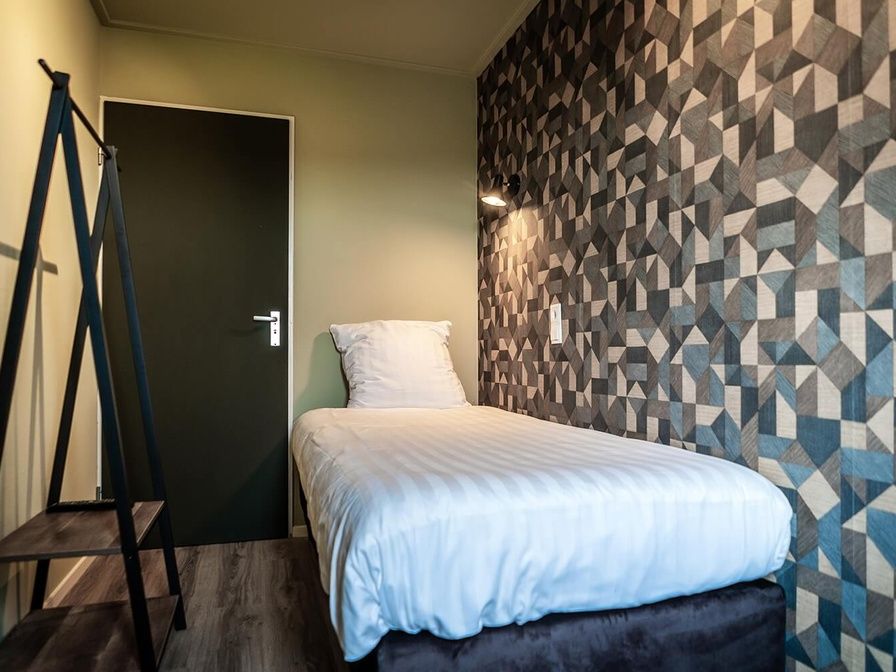 Unterkunft 0101820 - Ferienhaus Texel - Kleine eenpersoonskamer met uitzicht op de tuin