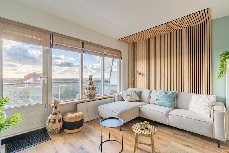 Gezellige zithoek in Appartement Juliana 140 Eiland en Zeezicht, De Koog, Texel met uitzicht op zee.