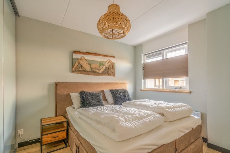Comfortabele slaapkamer in Appartement Juliana 140 Eiland en Zeezicht, De Koog, Texel met rustgevend interieur.