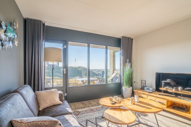 Lichte zithoek in Appartement Juliana 048 met zeezicht in De Koog, Texel, Waddeneilanden.