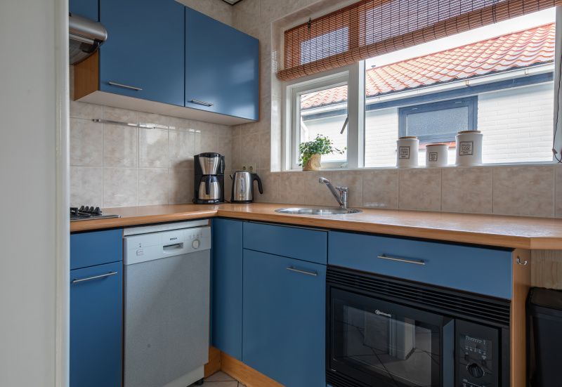 Moderne keuken van Riddertje in De Koog, Texel. Volledig uitgerust vakantiehuis op de Waddeneilanden.