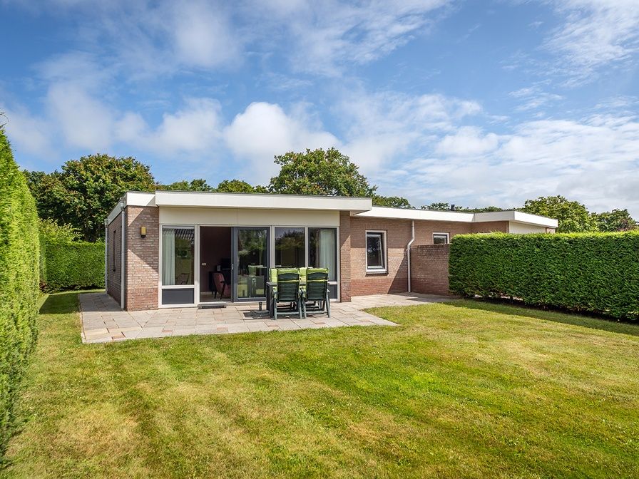 Bungalow 31 in De Koog, Texel with spacious garden and terrace surrounded by nature.