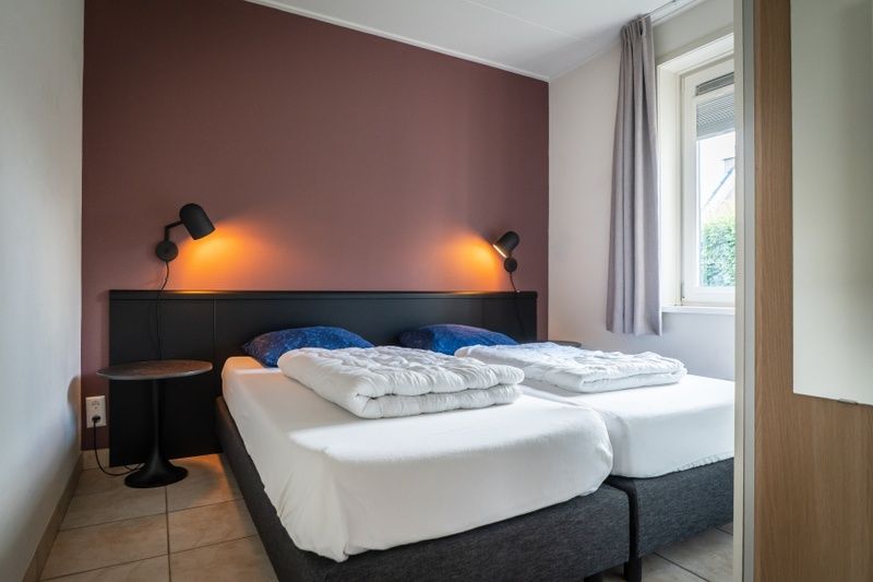 Comfortable bedroom with double bed in Bungalow 31, De Koog, Texel.