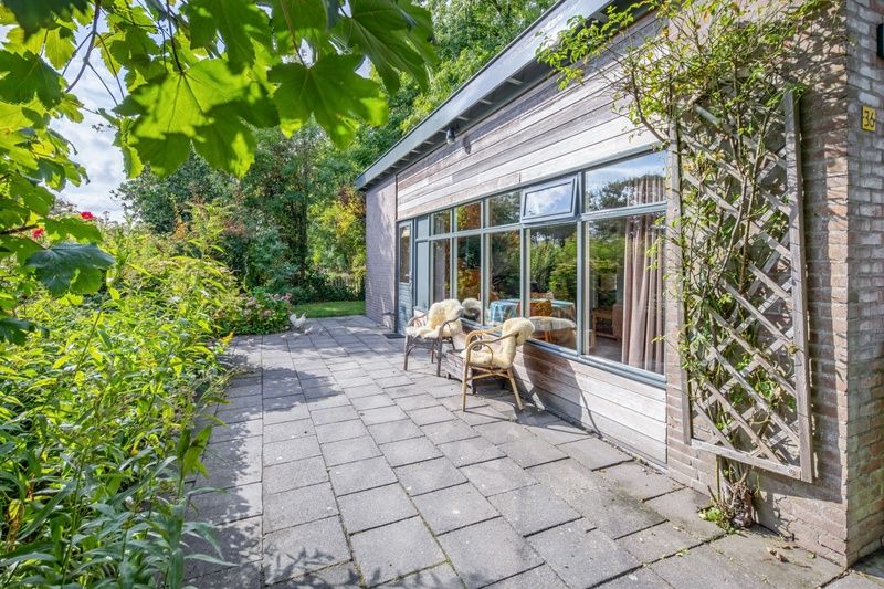 Buitenruimte van De Zonneweelde, een vakantiehuis in De Koog, Texel met uitzicht op de tuin.