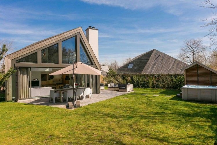 Gezellig vakantiehuis Duynzoom 1 whirlpool & Sauna in De Koog, Texel met ruime tuin en terras.