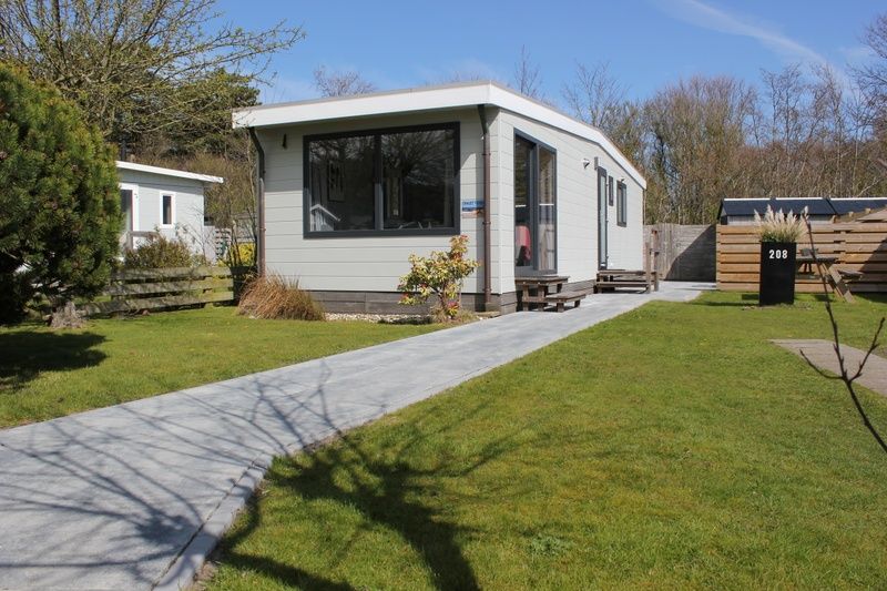 Chalet Bregkoog 208, een vakantiehuis in De Koog, Texel, met een zonnige tuin en een rustige ligging op de Waddeneilanden.
