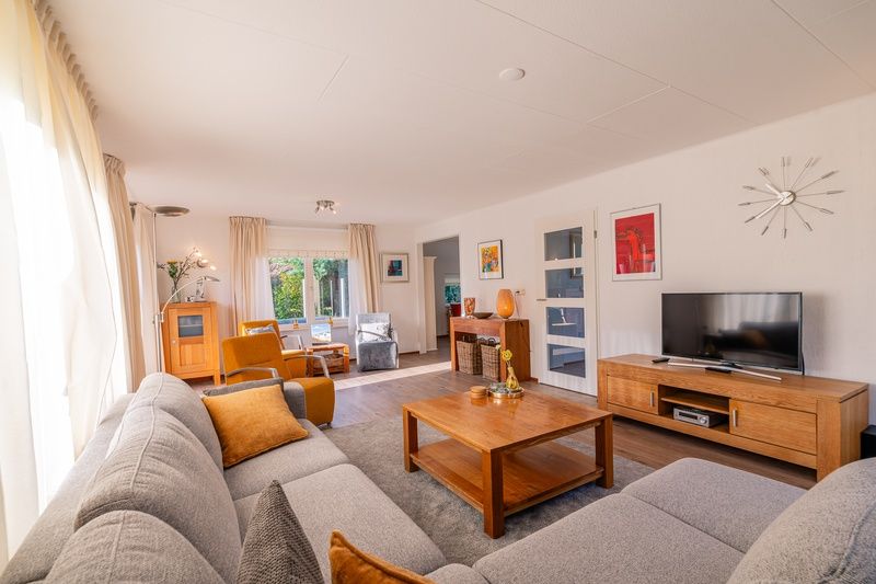 Spacious living room in Holiday home Honeysuckle 61, De Koog, Texel, Wadden Islands.