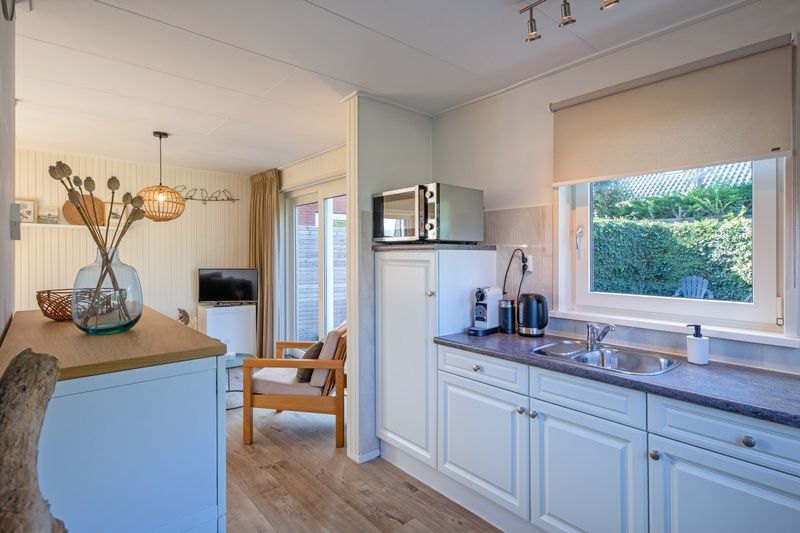 Gezellige woonkamer van De Veldleeuwerik vakantiehuis in De Koog, Texel, Waddeneilanden.