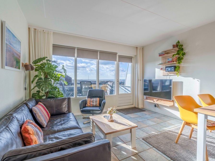 Gemuetliches Wohnzimmer im Appartement Juliana 142 Insel und Meerblick in De Koog, Texel mit Meerblick.