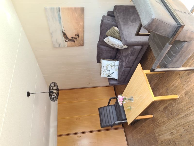 Luftaufnahme der Umgebung von Motel Texel Appartement, De Koog, Texel mit nahegelegener Natur und Kueste.