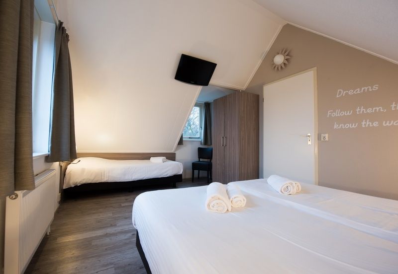 Gezellige slaapkamer in Villa 9, ideaal vakantiehuis in De Koog Texel voor families.