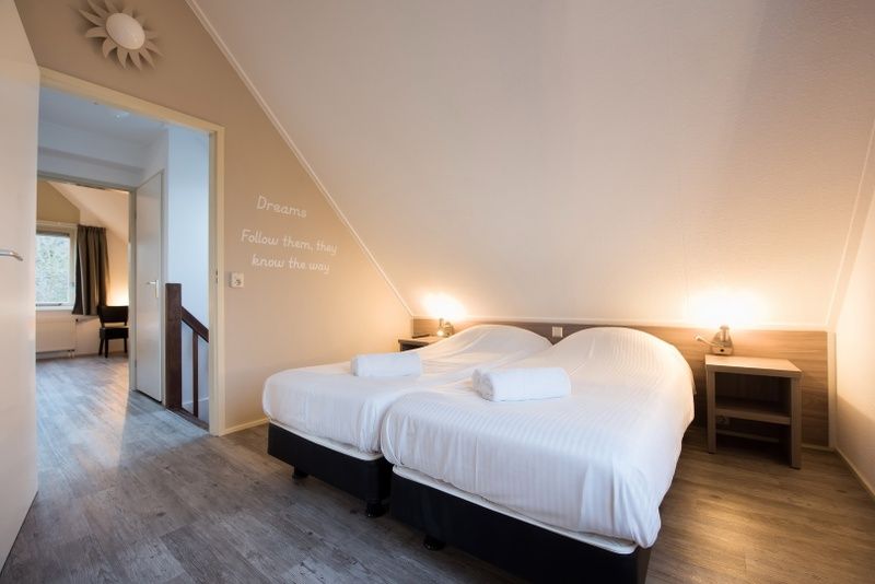 Comfortabele bedden in Villa 9, vakantiehuis in De Koog Texel voor een ontspannen verblijf.