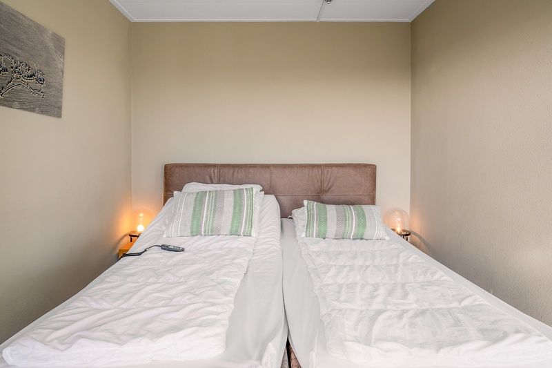 Komfortables Schlafzimmer im Appartement Juliana 178 Eilandzicht, De Koog, Texel. Perfekte Ferienunterkunft auf den Watteninseln.