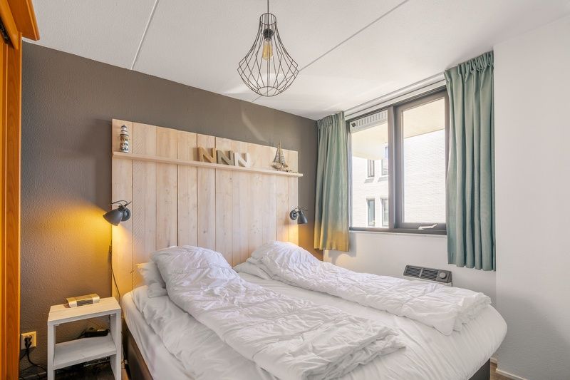Attractive bedroom in Apartment Juliana 094 Eiland en Zeezicht, De Koog, Texel with comfortable double bed.