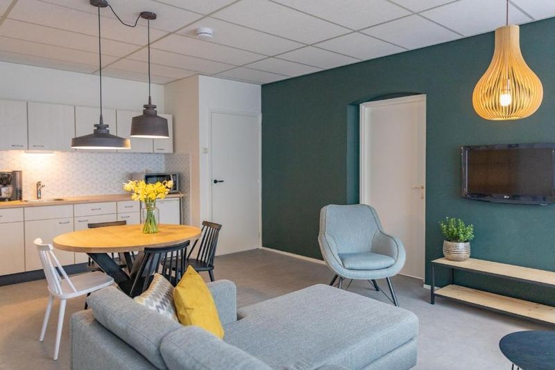 Offene Kueche und Wohnraum im Apartment 4 Personen, De Koog, Texel, ideal fuer einen entspannenden Urlaub.