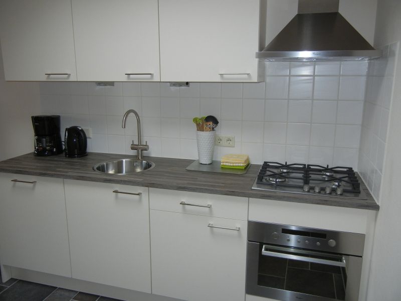 Die geraeumige Dusche im Holiday home 2, De Koog, Texel bietet Komfort und Entspannung nach einem Tag auf Texel.