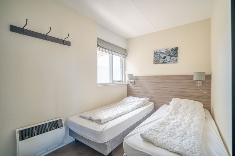 Second bedroom with two single beds in Apartment Juliana 132 Eilandzicht, De Koog, Texel.