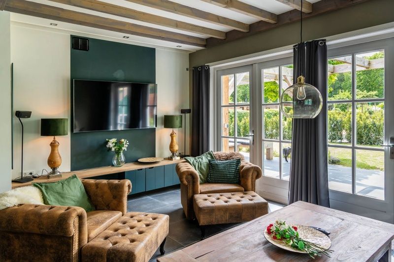 Wohnzimmer der Residence Rustic holiday home in De Koog, Texel, mit bequemen Stuehlen