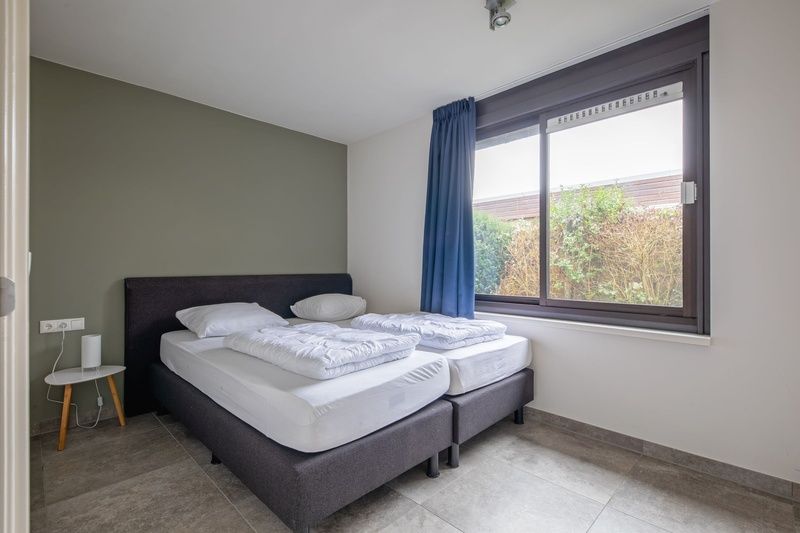 Tweede slaapkamer in Orchismient 20 vakantiehuis De Koog Texel met comfortabel tweepersoonsbed.